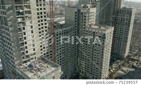 Aerial view of details of a generic multi-storey building construction site 75239557