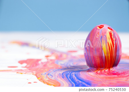 Painting Easter eggs, Preparation for spring holiday, Liquid marble texture, Marble ink colorful, Fluid art Abstract Trend, Copyspace 75240530