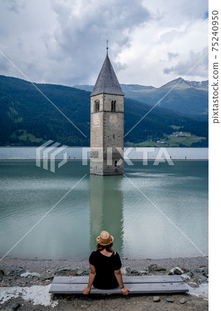 The famours sunken church of reschensee, austria The famours sunken church of reschensee, austria 75240950
