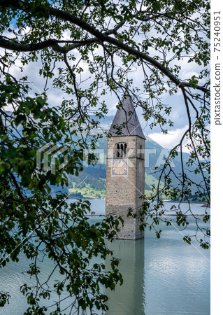 The famous sunken church of reschensee, austria 75240951