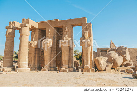 Ruins of the Egyptian temple of Ramesseum, the funeral temple of Pharaoh Ramses II XIII century BC , near the modern city of Luxor 75241272