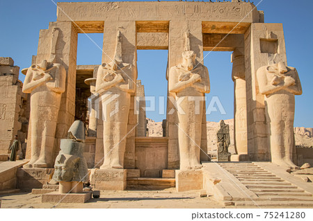 Ruins of the Egyptian temple of Ramesseum, the funeral temple of Pharaoh Ramses II XIII century BC , near the modern city of Luxor 75241280