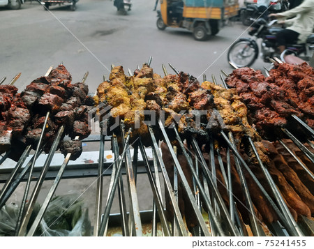 Royalty-free stock photo ID: 96853159Kebabs - Selection of chicken tikka, paneer tikka and seekh kebabs served with crunchy salad, mint raita and lemon wedges. Royalty-free stock photo ID: 96853159Kebabs - Selection of chicken tikka, paneer tikka and seekh kebabs served with crunchy salad, mint raita and lemon wedges. 75241455