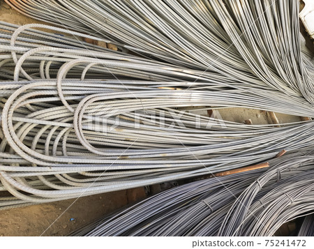 Steel rods or bars used to reinforce concrete, in warehouse 75241472