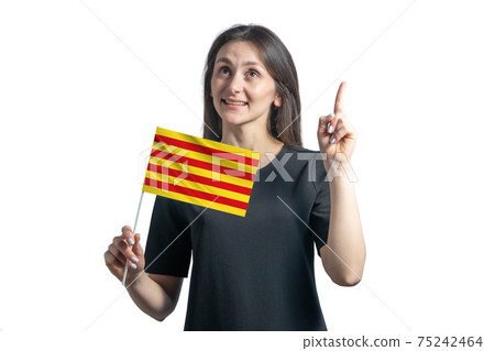 Happy young white woman holding flag of Catalonia and points thumbs up isolated on a white background Happy young white woman holding flag of Catalonia and points thumbs up isolated on a white background 75242464