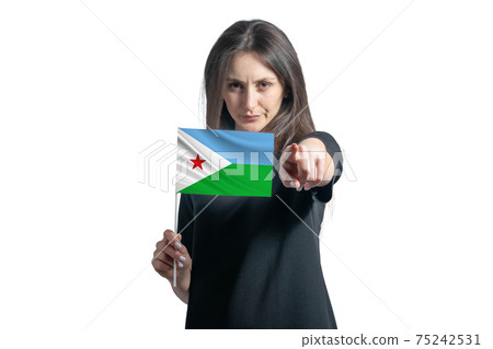 Happy young white woman holding flag of Djibouti and points forward in front of him isolated on a white background Happy young white woman holding flag of Djibouti and points forward in front of him isolated on a white background 75242531