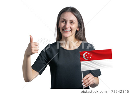 Happy young white woman holding flag of Singapore and shows the class by hand isolated on a white background Happy young white woman holding flag of Singapore and shows the class by hand isolated on a white background 75242546