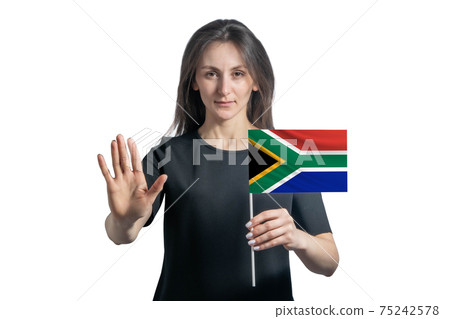 Happy young white woman holding flag of South African Republic and with a serious face shows a hand stop sign isolated on a white background 75242578