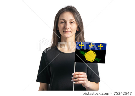 Happy young white girl holding Guadeloupe flag isolated on a white background Happy young white girl holding Guadeloupe flag isolated on a white background 75242847