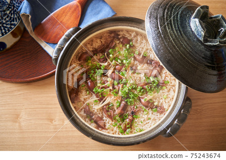 Firefly squid rice cooked in a clay pot 75243674