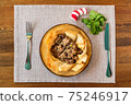 Appetizing meat in baked lavash according 75246917