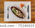 Edible flowers salad with oil, onion and salt. Jonjoli - delicious Georgian appetizer salad. 75246929