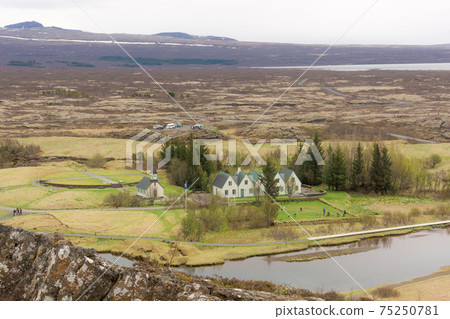 Iceland overlooking the church from a crack in the earth Iceland overlooking the church from a crack in the earth 75250781