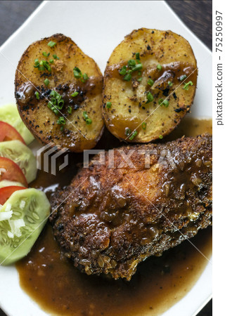 cordon bleu breaded fried chicken gravy and potatoes meal cordon bleu breaded fried chicken gravy and potatoes meal 75250997
