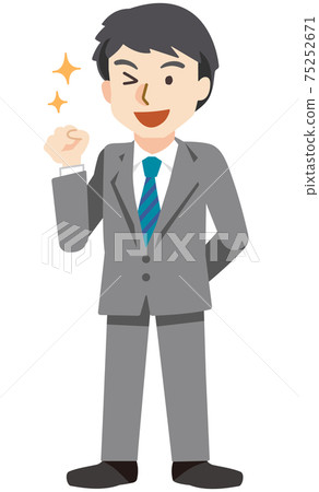 A businessman who winks and makes a guts pose with a smile 75252671