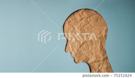 Aging Concept. Shape of Woman Head created by Crumpled Craft Paper Cut. Old Wrinkled Skin Lady. Sadness Female Face Aging Concept. Shape of Woman Head created by Crumpled Craft Paper Cut. Old Wrinkled Skin Lady. Sadness Female Face 75252824
