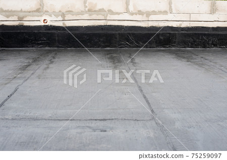 Waterproofing flat roof terrace with roll bitumen Waterproofing flat roof terrace with roll bitumen 75259097