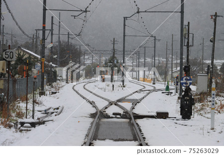 Snow scene at Tomura Station on the Obama Line 75263029