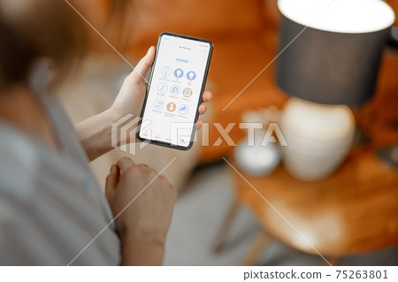 Smartphone with launched application to adjust the light bulb Smartphone with launched application to adjust the light bulb 75263801