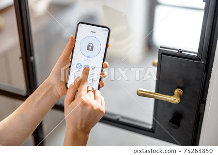 Smartphone with launched application for alarm security 75263850