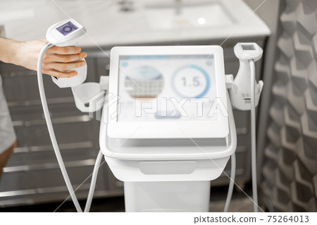 Ultrasound liposuction treatment device in medical clinic. Ultrasound liposuction treatment device in medical clinic. 75264013