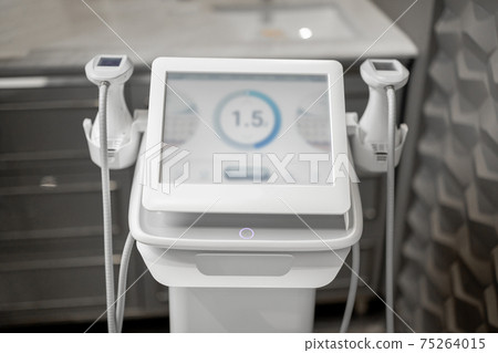 Ultrasound liposuction treatment device in medical clinic. Ultrasound liposuction treatment device in medical clinic. 75264015