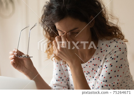 Young woman suffer of vision problem dizzy bad sight 75264671