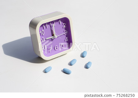 PrEP ( Pre-Exposure Prophylaxis) used to prevent HIV with clock on white PrEP ( Pre-Exposure Prophylaxis) used to prevent HIV with clock on white 75268250