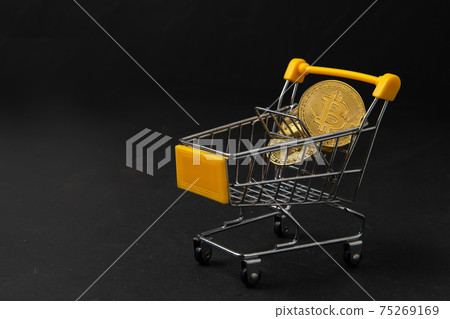 bit coin in yellow trolley on black background, electronic virtual money for web banking and international network payment, bit coin in yellow trolley on black background, electronic virtual money for web banking and international network payment, 75269169