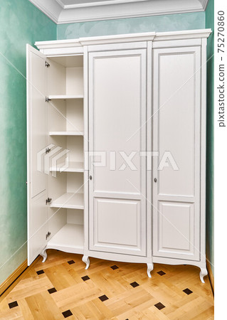 White wardrobe in classical style with inner shelves White wardrobe in classical style with inner shelves 75270860