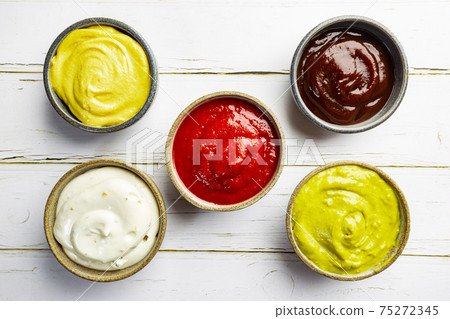Set of different dip sauces Set of different dip sauces 75272345