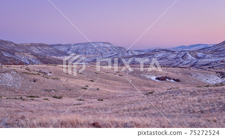 winter dusk over Colorado foothills of Rocky Mountains 75272524