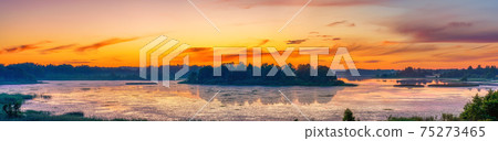 Bright sunset on a lake Bright sunset on a lake 75273465