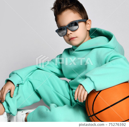 Portrait of cool handsome kid boy in pastel modern 75276392