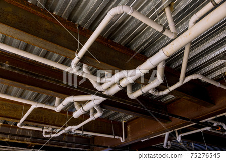 Plumbing rough-in in commercial building with pvc pipe Plumbing rough-in in commercial building with pvc pipe 75276545