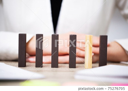 Beautiful young woman demonstrates on wooden bars business development concept Beautiful young woman demonstrates on wooden bars business development concept 75276705