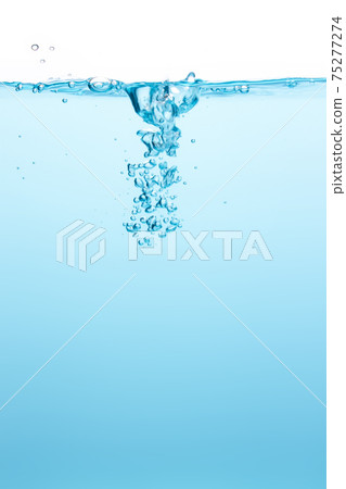 Many blurry bubbles Floating from the middle of the blue water To the surface with little waves Blue liquid background Many blurry bubbles Floating from the middle of the blue water To the surface with little waves Blue liquid background 75277274