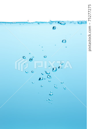 Water waves make bubbles and splashes in the clear blue water. Bubbles in blue liquid Water waves make bubbles and splashes in the clear blue water. Bubbles in blue liquid 75277275