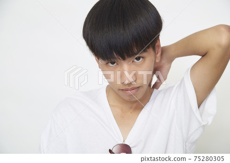 Handsome Asian guy on white Handsome Asian guy on white 75280305