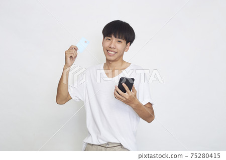 man Holding a card with a phone man Holding a card with a phone 75280415