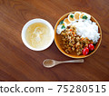 Lunch of dry curry and soup on the table 75280515