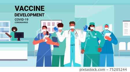 doctors team in medical masks holding syringe and bottle vial coronavirus vaccine development medical immunization 75285244