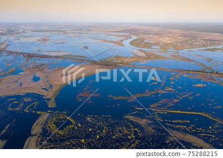Scenic aerial view of high water in spring time Scenic aerial view of high water in spring time 75288215