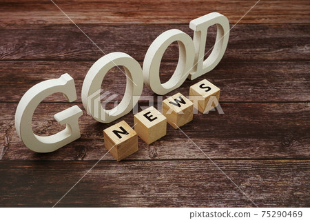 Good News Word alphabet letters on wooden background Good News Word alphabet letters on wooden background 75290469