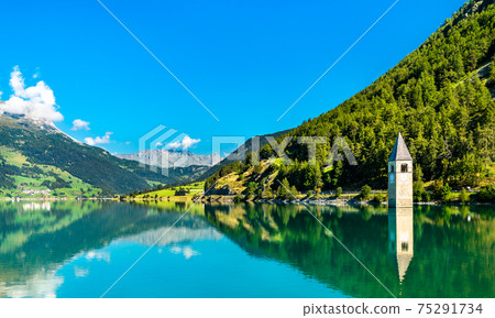 Submerged Bell Tower of Curon on Lake Reschen in South Tyrol, Italy 75291734