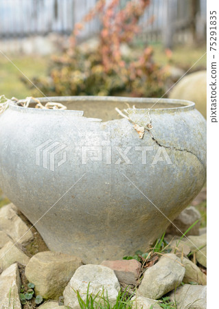 Old pitched pitcher like scenery in the garden. 75291835