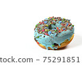 View of sweet donut with blue icing and crushed candies. 75291851