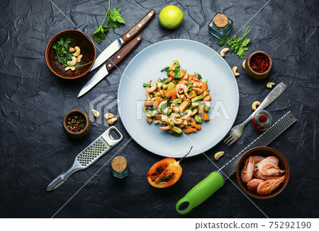 Exotic salad with tamarillo and prawn Exotic salad with tamarillo and prawn 75292190