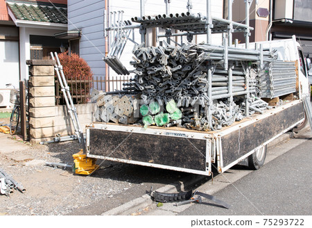 Scaffolding material loaded on trucks Scaffolding material loaded on trucks 75293722