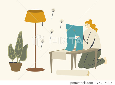 Woman Sitting at Table in Living Room Cutting Decorative Wall Stickers of Floral Design for Making Coziness at Home 75296007